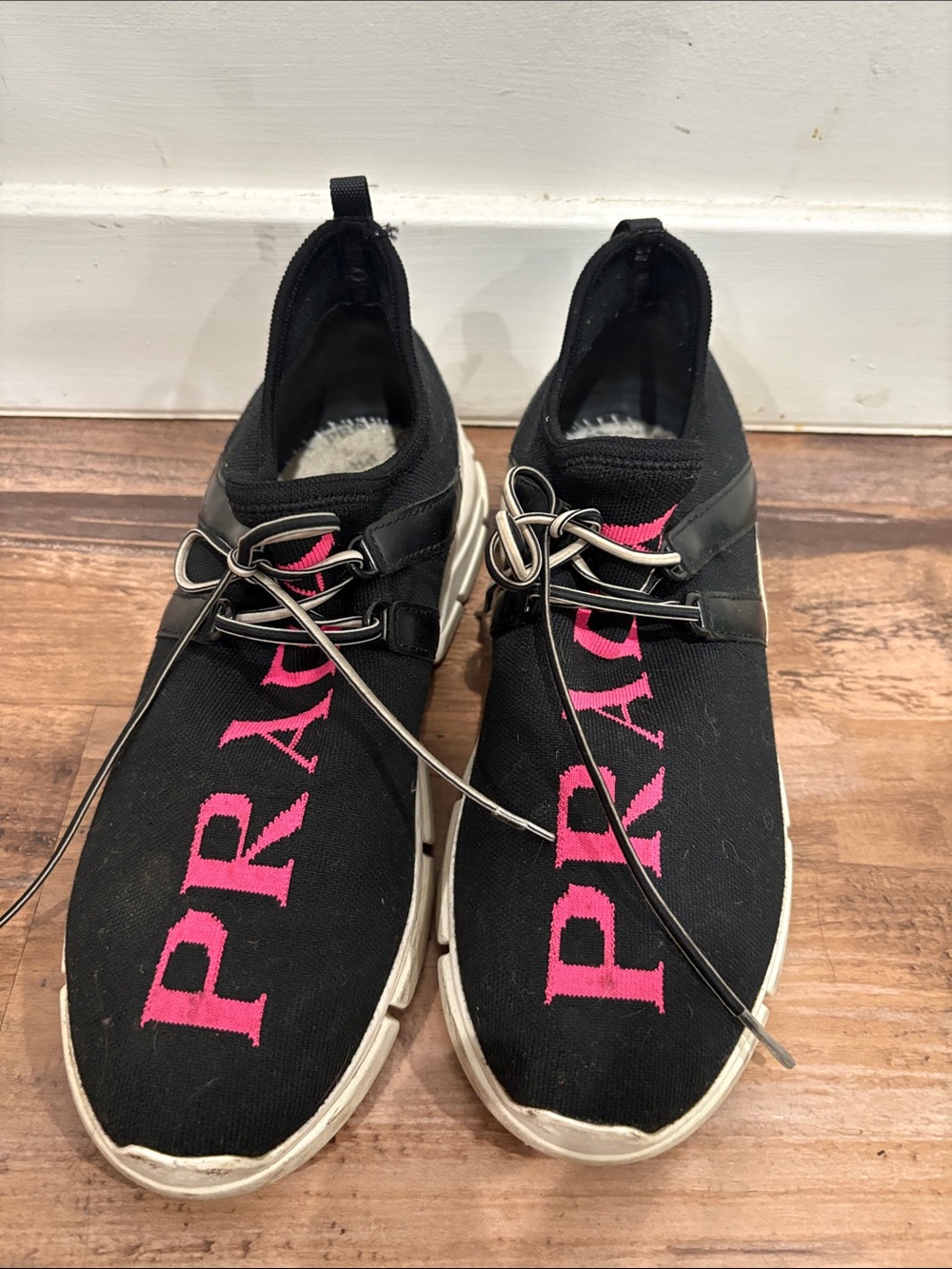 Prada Black Slip-On Knit Sneakers with Pink Logo
